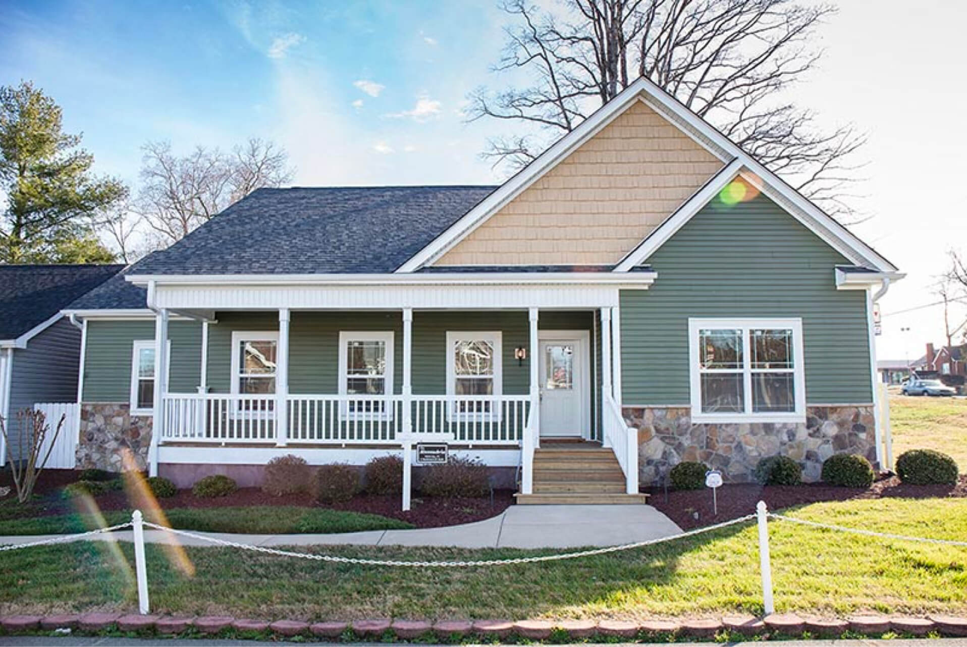 Green Wall and Blue Roof Custom Modular Home